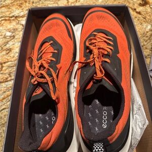 Ecco Orange Sneakers with Bold Design and Lace-Up Style